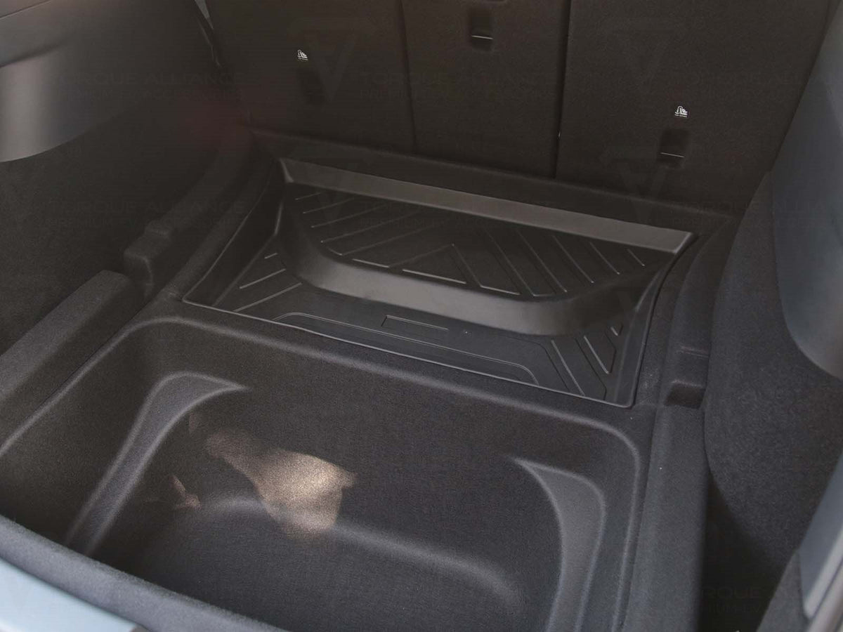 Tesla Model Y: Kordelzug im Kofferraum für versteckten Stauraum - Torque  Alliance
